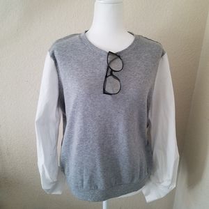 Grey sweater and white cotton sleeves